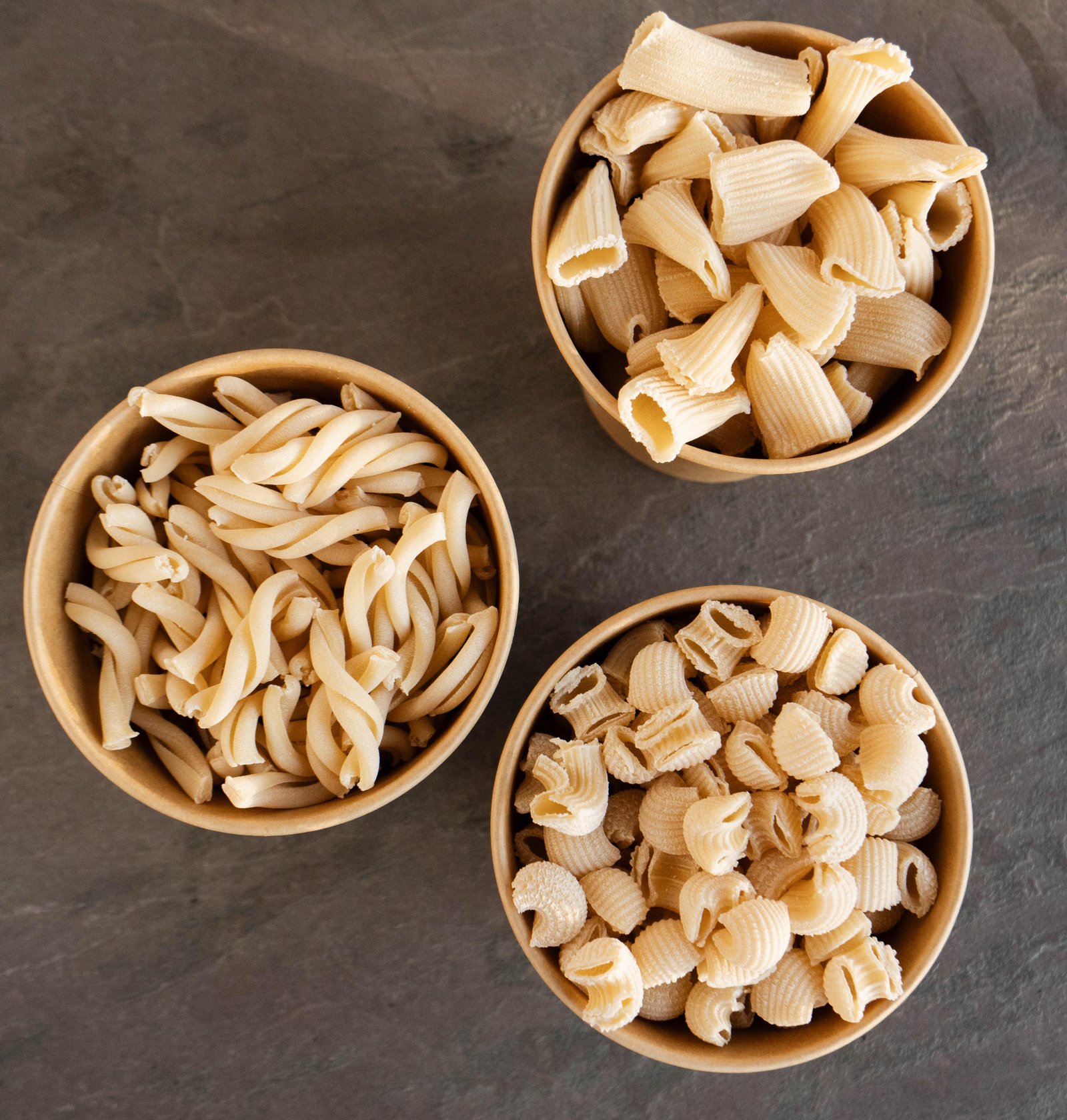 Three types of fresh handmade pasta served at Pasta Bar Santorini, Oia